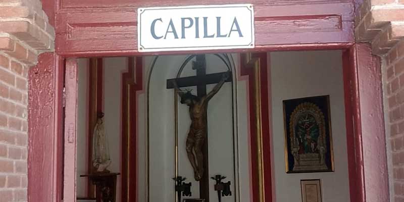 The Virgin of La Paloma, popular patron of Madrid, presides over the chapel altar
